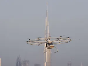 A video shows the flying taxi whirring through the sky before returning to base. (Gulf Business)