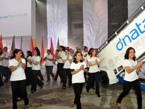 dnata employees bearing flags representing the 38 countries in which dnata does business