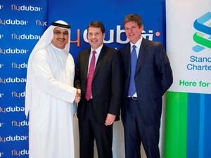 flydubai’sCEO, Ghaith Al Ghaith, Jonathan Morris, CEO, Standard Chartered UAE and Kieran Corr, Chief Commercial Officer Pembroke Group at the contract signing