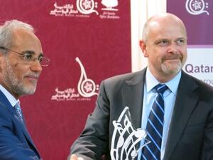  Dr. Abdul Ghafour Al Heeti, Principal of Qatar Music Academy, with Mr. Steve Kelly, President and General Manager of Occidental Petroleum Qatar Ltd. 