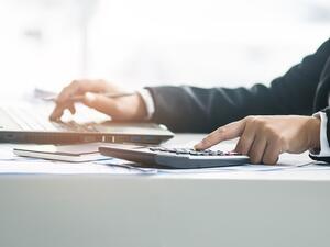 Almost half of respondents in a survey claim they have less debt now than they did last year. (Shutterstock)