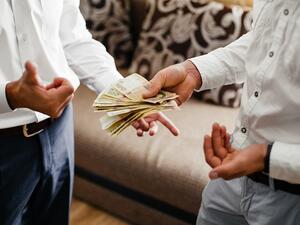 Borrowing money from friends is not different from asking for a loan from the bank. Here are tips to guide you. (Shutterstock)