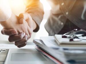 Abu Dhabi Commercial Bank (ADCB) said that merger talks with Union National Bank (UNB) and Al Hilal are at a very preliminary stage.