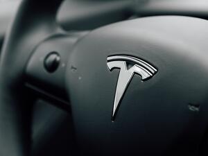 Shares plunged following the announcement, which also signaled a tough profit road ahead for Tesla. (Shutterstock)