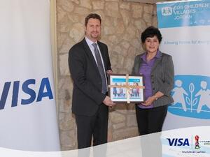 Nabil Tabbara, General Manager for Levant of Visa; and, Muna Hamdan, National Director of SOS Children’s Villages Association of Jordan