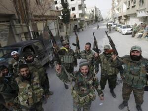 The regime was also blamed for the execution of medical staff and local media. (AFP/Joseph Eid)