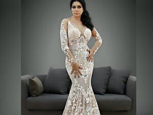 Rania did not escape from sarcastic comments on the new white dress she chose for her latest photoshoot (Source: raniayoussef_- Instagram)