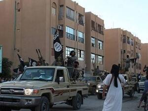 Daesh militants parade through the streets of Raqqa. (AFP/File)