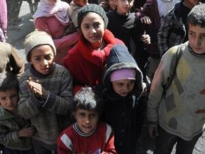 Children from Syria's besieged Yarmouk refugee camp for Palestinian refugees (AFP/File Photo)	