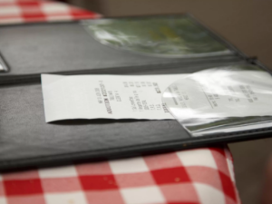 Who knew that covering a check could lead to death? (Shutterstock)