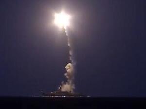 An image grab from a video released by Russia's defense ministry shows a Russian warship firing cruise missiles into Syria from the Caspian Sea. (YouTube)