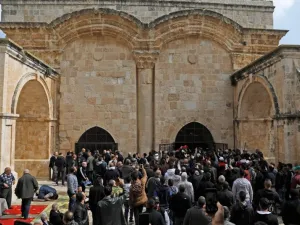Palestinians worshippers gather before Friday noon prayers last week at the so-called 'Golden Gate' in Jerusalem's Old City. (AFP/ File Photo)