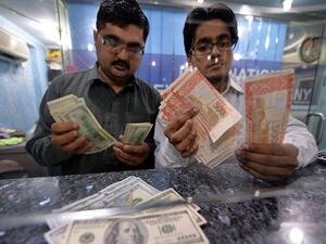 Remittances by foreign workers have witnessed a steady fall in recent months as banks in Kingdom reported a gradual decline in foreign remittances. (AFP/ File) Remittances by foreign workers have witnessed a steady fall in recent months as banks in Kingdom reported a gradual decline in foreign remittances. (AFP/ File)