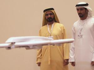 Sheikh Hamdan bin Mohammed bin Rashid al Maktoum together with his father Sheikh Mohammed bin Rashid al Maktoum (left) visiting the "Virtual Future" exhibition in Dubai on 9 February 2014. (AFP/File) Sheikh Hamdan bin Mohammed bin Rashid al Maktoum together with his father Sheikh Mohammed bin Rashid al Maktoum (left) visiting the "Virtual Future" exhibition in Dubai on 9 February 2014. (AFP/File)