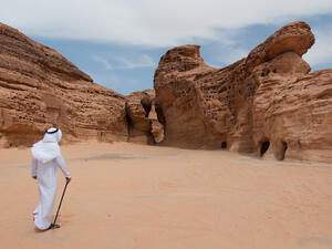 Saudian walking in Madain Saleh archeological site, Saudi Arabia. (Shutterstock/ File Photo)