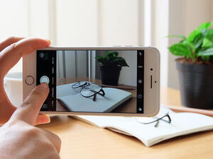 An Apple iPhone 7 plus taking a photo. (Shutterstock)