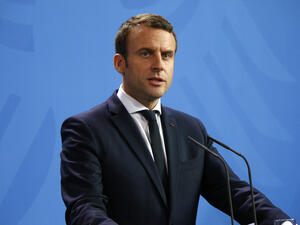 Macron said that Assad can be accepted in the peace talks and transition process to end the civil war in Syria (Shutterstock/File)
