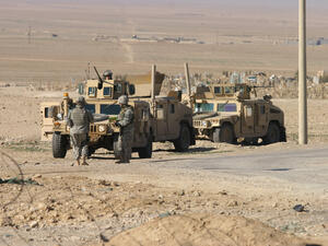 U.S. troops stand guard in a check point in Maxmur, Iraq.. (Shutterstock/ File Photo)