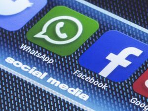 The new currency will allow users to transfer money via its mobile messaging service WhatsApp. (Shutterstock)