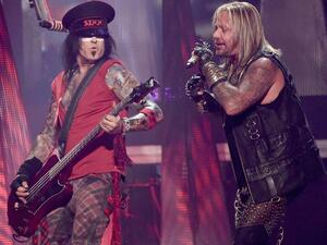 Bassist Nikki Sixx and singer Vince Neil of Motley Crue perform onstage. (AFP/File)
