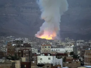Smoke billows following an air-strike by Saudi-led coalition on May 11, 2015, in the capital Sanaa.(AFP/Mohammed Huwais)