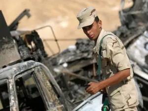 An Egyptian soldier stands guard in an ongoing military operation against militants in the restive Sinai Peninsula (AFP/File Photo)