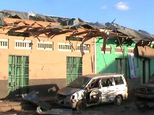 Destroyed buildings and vehicles are seen on 28 February, 2016 in Baidoa after twin explosions in the Somali city killed at least 25 people. (AFP/Stringer)