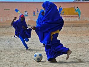 Somali school girls play football during lunch break at the Howlwadag Primary School in Howlwadag District, south of Mogadishu, on October, 5, 2016. (AFP/Mohamed Abdiwahab)