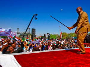 Sudanese President Omar Al Bashir Dances for his supporters in Khartoum. (AFP)