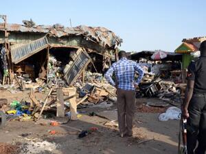 Residents look at the aftermath of another suicide bombing in Maiduguri, Nigeria. (AFP/File)