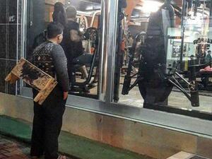 Mohammed Khaled was seen wearing sandals and carrying his shoe polishing gear gazing longingly at the equipment inside (Twitter)