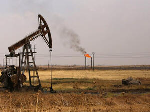 Oil well pumps are seen in the Rmeilane oil field in Syria's northeastern Hasakah province on July 15, 2015.