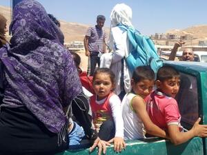 Syrian refugees arrive in Wadi Hamayyed, on the outskirts of Lebanon’s northeastern border town of Arsal. (AFP/ File Photo)