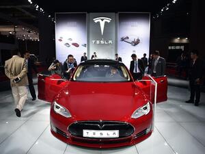 Tesla at the 2016 Shanghai Auto Show. (Johannes Aisele/ AFP) Tesla at the 2016 Shanghai Auto Show. (Johannes Aisele/ AFP)