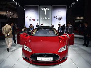 A Tesla Model S car is displayed at the 16th Shanghai International Automobile Industry Exhibition on April 20, 2015. (Johannes Eisele/ AFP) A Tesla Model S car is displayed at the 16th Shanghai International Automobile Industry Exhibition on April 20, 2015. (Johannes Eisele/ AFP)
