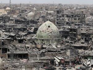 In May, the Iraqi government reported that the country needed $100 billion to rebuild ISIS-liberated regions (AFP/File)