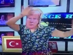 Night-time Turkish TV has a belly dancer wearing a Trump mask (Screenshot/Twitter)
