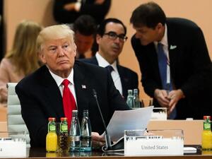 US President Donald Trump attends a working session during the G20 summit in Hamburg on July 8, 2017. (Markus Schreiber/ AFP) US President Donald Trump attends a working session during the G20 summit in Hamburg on July 8, 2017. (Markus Schreiber/ AFP)