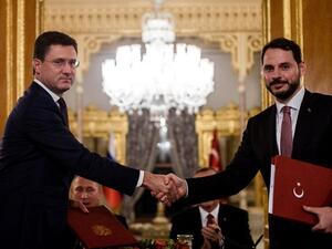 Turkish energy minister Berat Albayrak (R) and his Russian counterpart shake hands after signing an agreement in Istanbul on October 10, 2016. (Ozan Kose/ AFP) Turkish energy minister Berat Albayrak (R) and his Russian counterpart shake hands after signing an agreement in Istanbul on October 10, 2016. (Ozan Kose/ AFP)