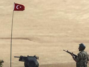A Turkish soldier patrols the increasingly volatile Turkish-Syrian border. (AFP/Bulent Kilic)