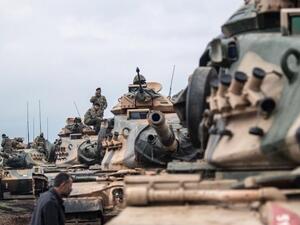 Turkish tanks waiting at the border of Afrin (AFP/FILE)