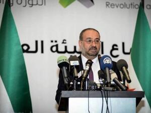 Ahmad Tuma, the leader of the SNC "does not represent us," according to the Free Syrian Army and 12 other opposition groups Wednesday (AFP)