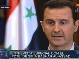 Syrian President Assad says "he does not discount" future possibilities of a US attack on Syria despite President Obama's statements at the UN this week (Courtesy of the Guardian)