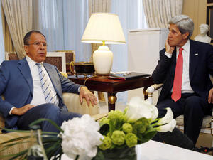 U.S. Secretary of State John Kerry meets with Russian Foreign Minister Sergei Lavrov in Paris on May 27 (Jim Young/ Pool/ AFP)