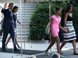 Obama leaves the Whitehouse with daughters, Sasha and Malla (image Getty)