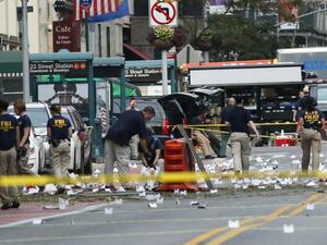 Law Enforcement Officers are seen at the scene of an explosion on West 23rd Street September, 18, 2016 in New York. (AFP/Kea Betancur)