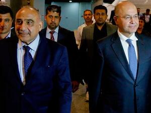 Iraq's new President Barham Salih, right, with new prime minister Adel Abdul Mahdi, left (Twitter)