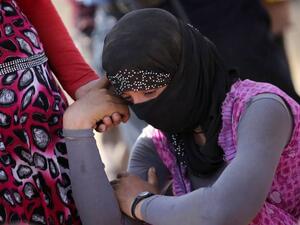 Many women and girls are paraded in 'slave bazaars.' (AFP/File)
