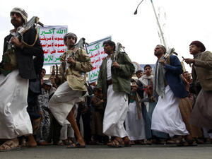 Supporters of the Houthi movement rally in the capital, Sanaa, and perform the traditional Baraa dance on July 24, 2015. (AFP/Mohammed Huwais)