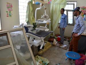 Yemenis inspect the damage in a room at an hospital operated by Doctors Without Borders (MSF), on August 16, 2016 in Abs, in the northern province of Hajja, a day after the hospital was hit by an airstrike by the Saudi-led coalition. (AFP/Stringer)